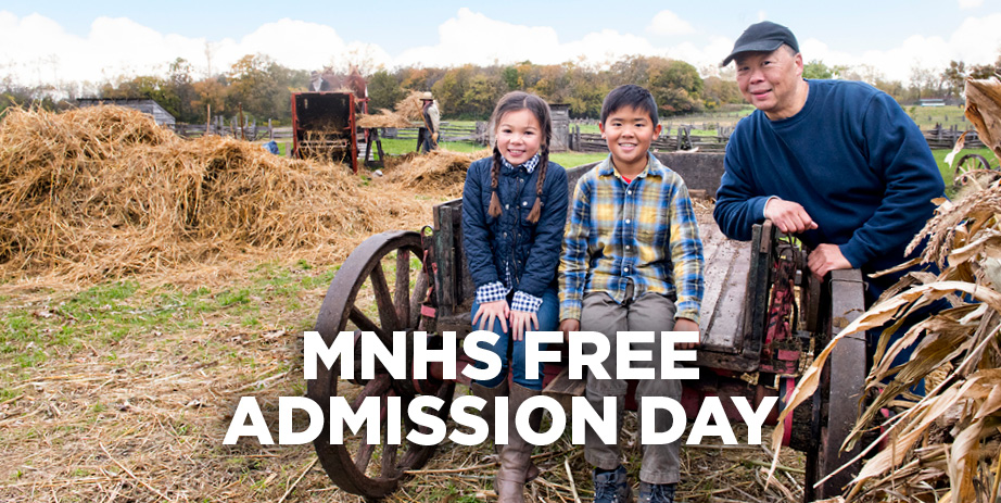 MNHS Free Admission Day text over an image of an adult and two children standing near a wagon