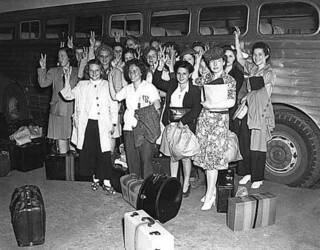 Women from Walker and Cass Lake enroute to detassel corn in southern Minnesota during manpower shortage.